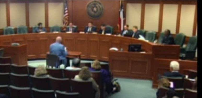 Dr. Paul Dunn testifying before a legislative committee